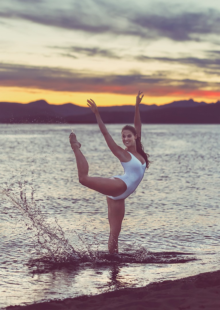 Ballet dancer showing attitude in the ocean at sunset<br />
More at <a rel=