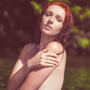 Redhead in the river