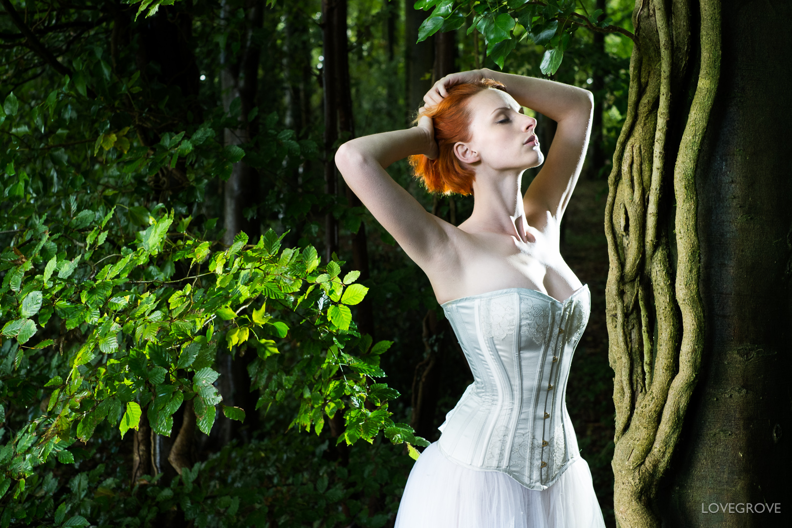 Victoria Lindsay Coutes in the woods modelling a corset and skirt by top designer Lisa Keating