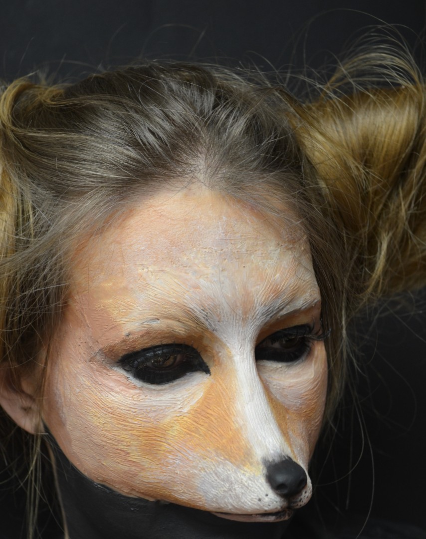 Animal people concept.  I created this prosthetic using silicone and finished the look using makeup and prosthetic paint.  I styled the hair into ears to finish the look.  <br />
Model - Leah Toomey